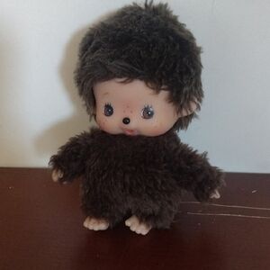Adorable Plush Doll with Brown Fur